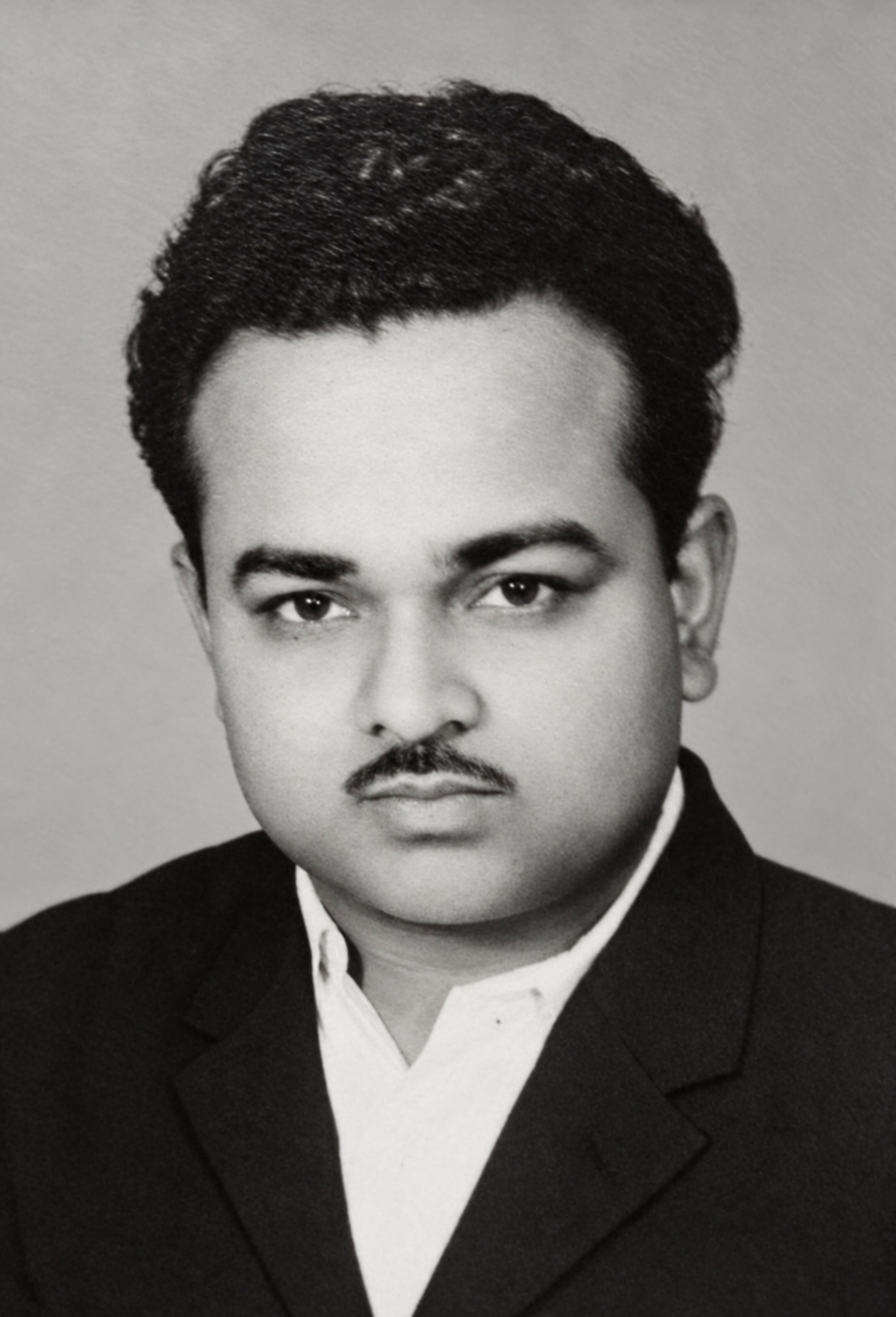 Restored archival portrait of Late Shri Omkarmal Agarwal, founder of Everest Transport Company